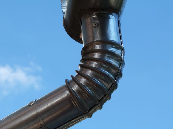 Metal Downspout Installation in Henderson