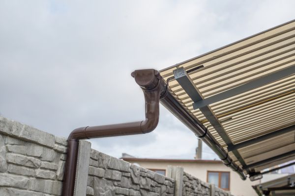 Plastic Downspout Installation in Henderson